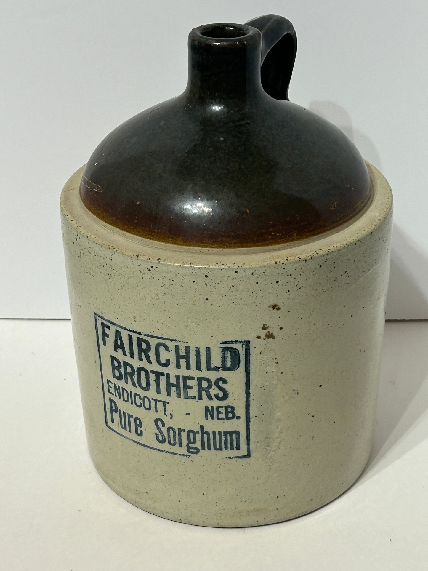 NEBRASKA STONEWARE ADVERTISING JUG FOR ENDICOTT NEBRASKA ADVERTISING FAIRCHILD BROTHERS PURE SORGHUM
