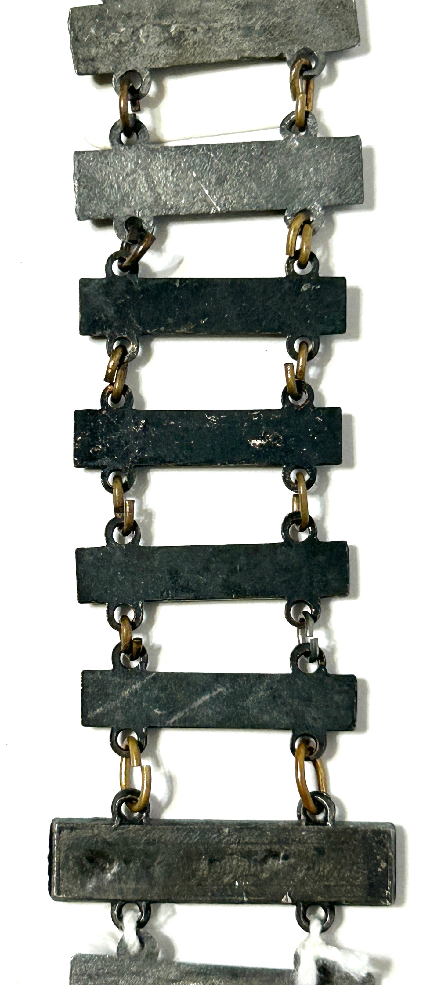 UNITED STATES MILITARY MARKSMAN LADDER BADGE WITH ELEVEN DIFFERENT QUALIFACATIONS