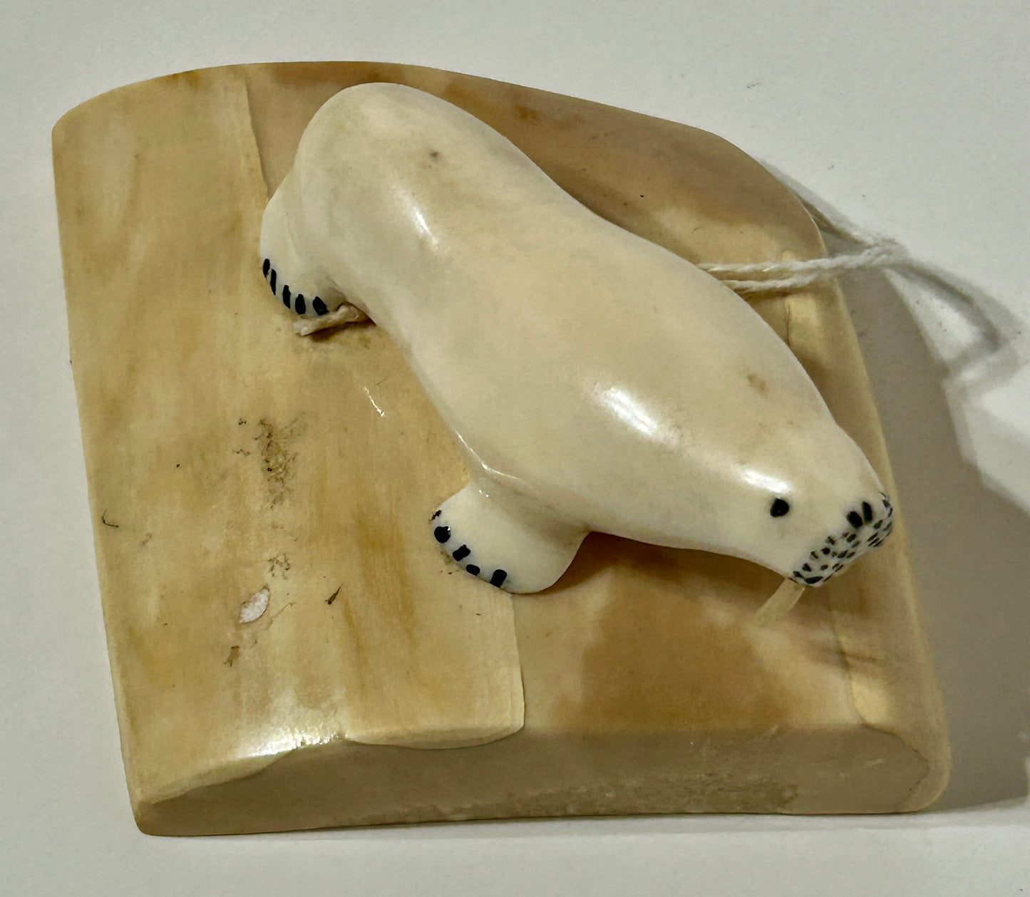 WALRUS IVORY CARVING OF WALRUS ON BASE