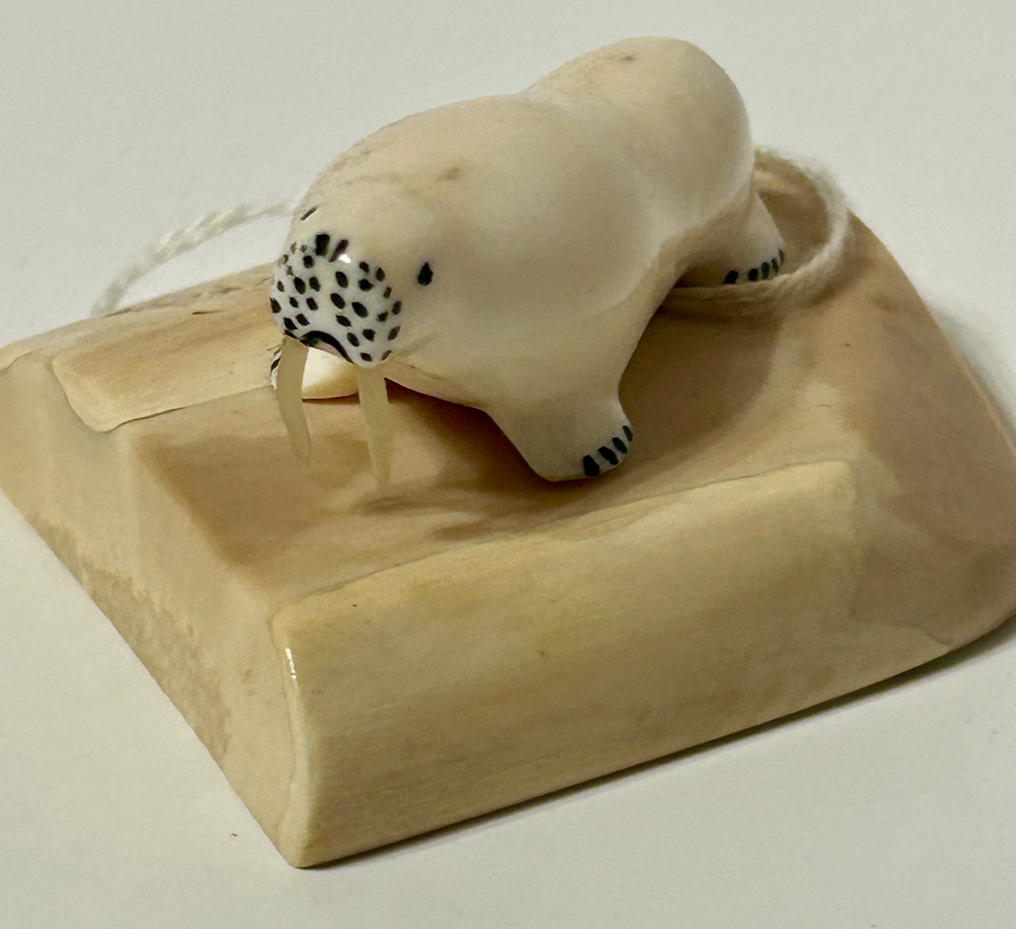 WALRUS IVORY CARVING OF WALRUS ON BASE
