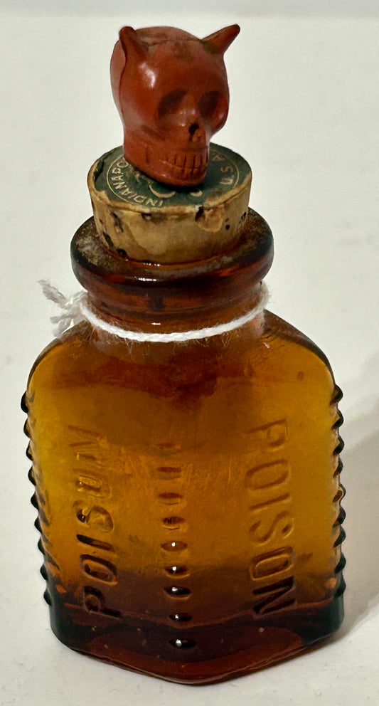 ANTIQUE POISON GLASS BOTTLE AMBER WITH SKULL STOPPER