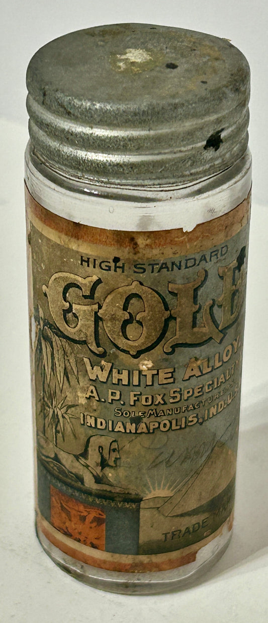 ANTIQUE BOTTLE LABELED GOLD ALLOY