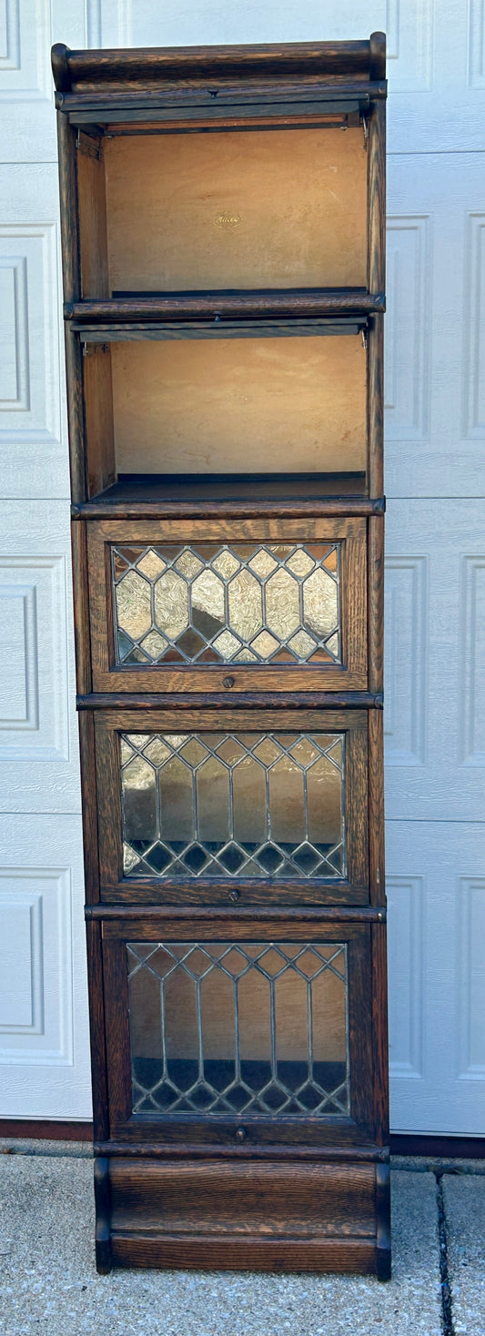 HALF SIZE FIVE STACK MISSION ANTIQUE OAK BOOKCASE WITH THREE LEADED DOOR SECTIONS