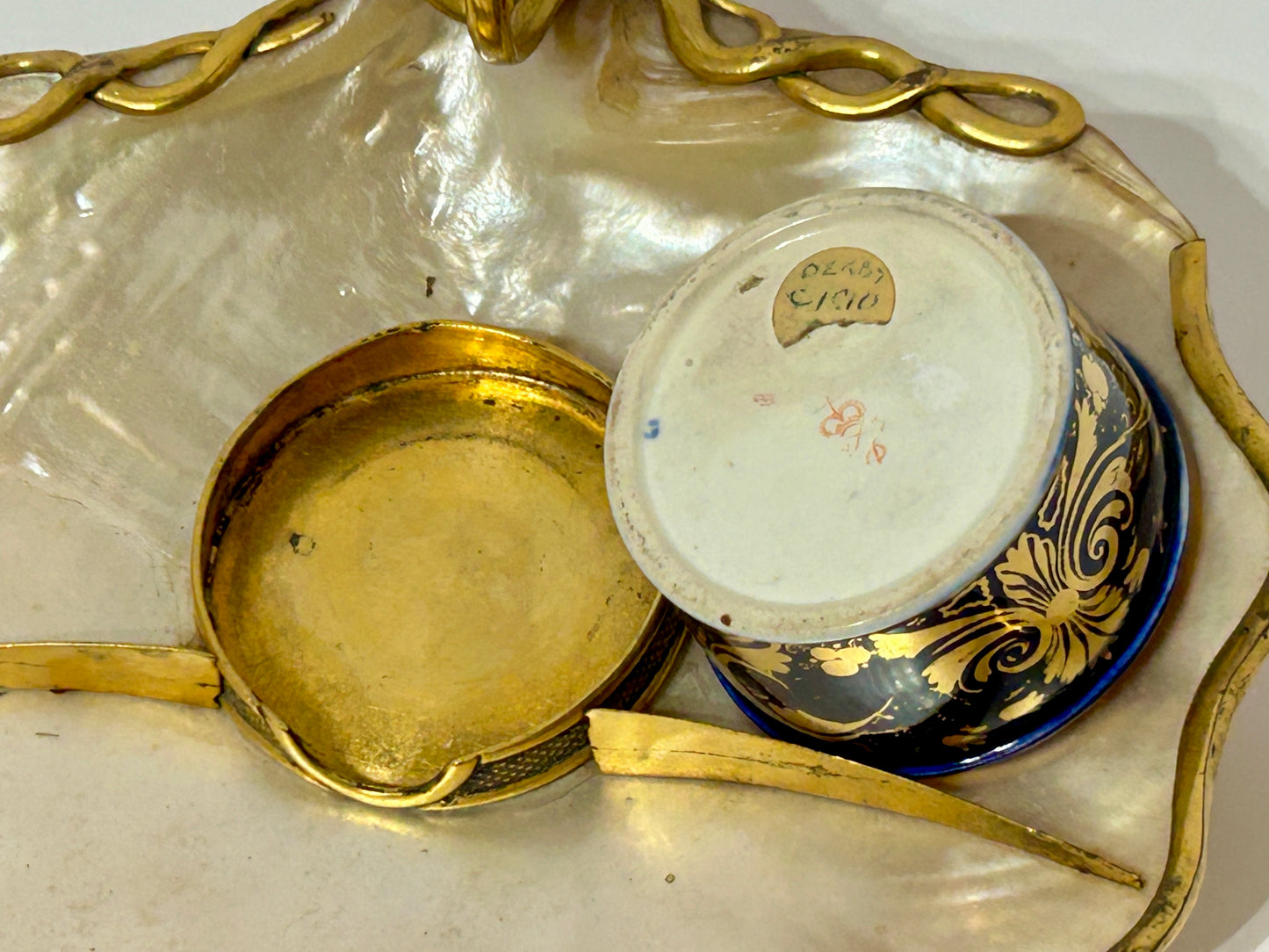 INKWELL WITH MOTHER OF PEARL AND BRONZE TRAY AND DERBY PORCELAIN INKWELL