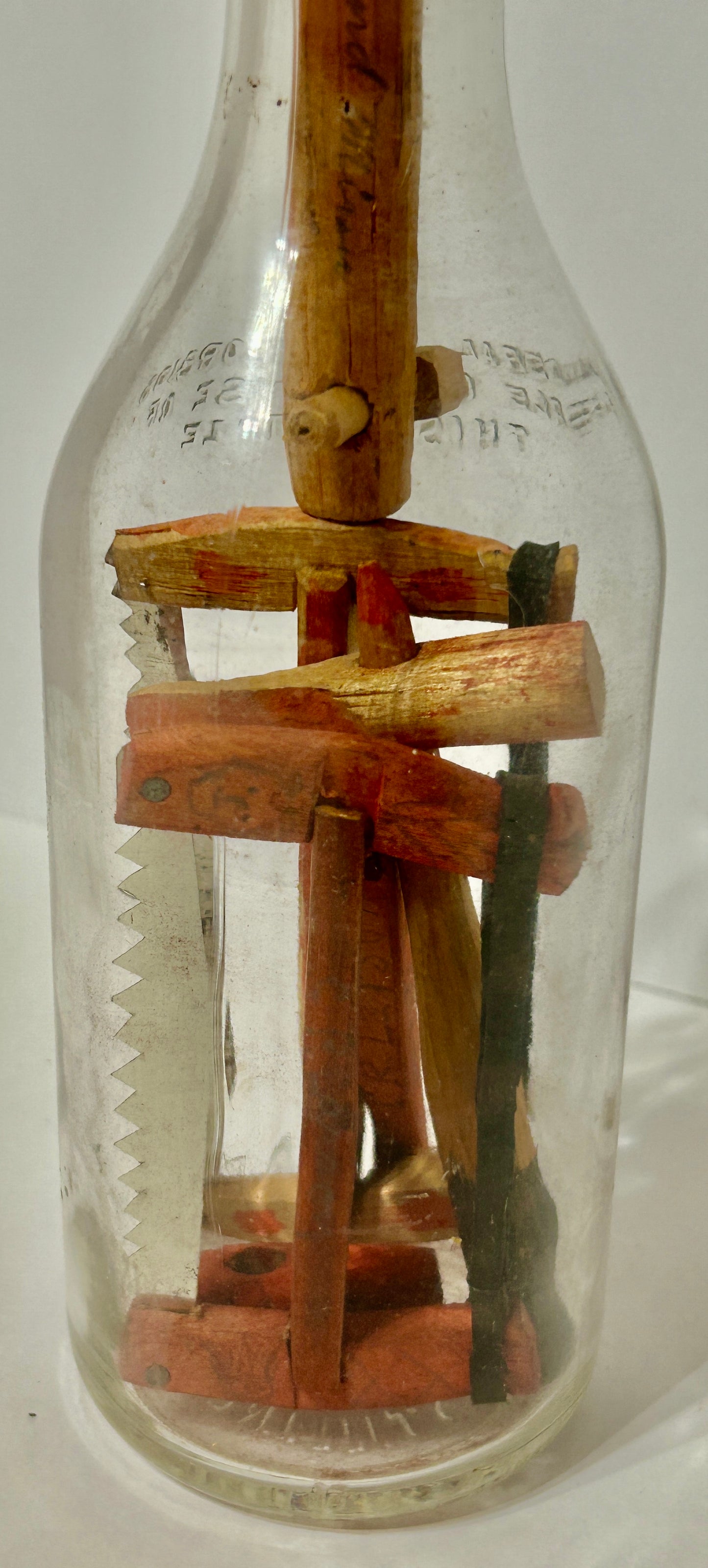 FOLK ART CARVED TOOLS IN BOTTLE