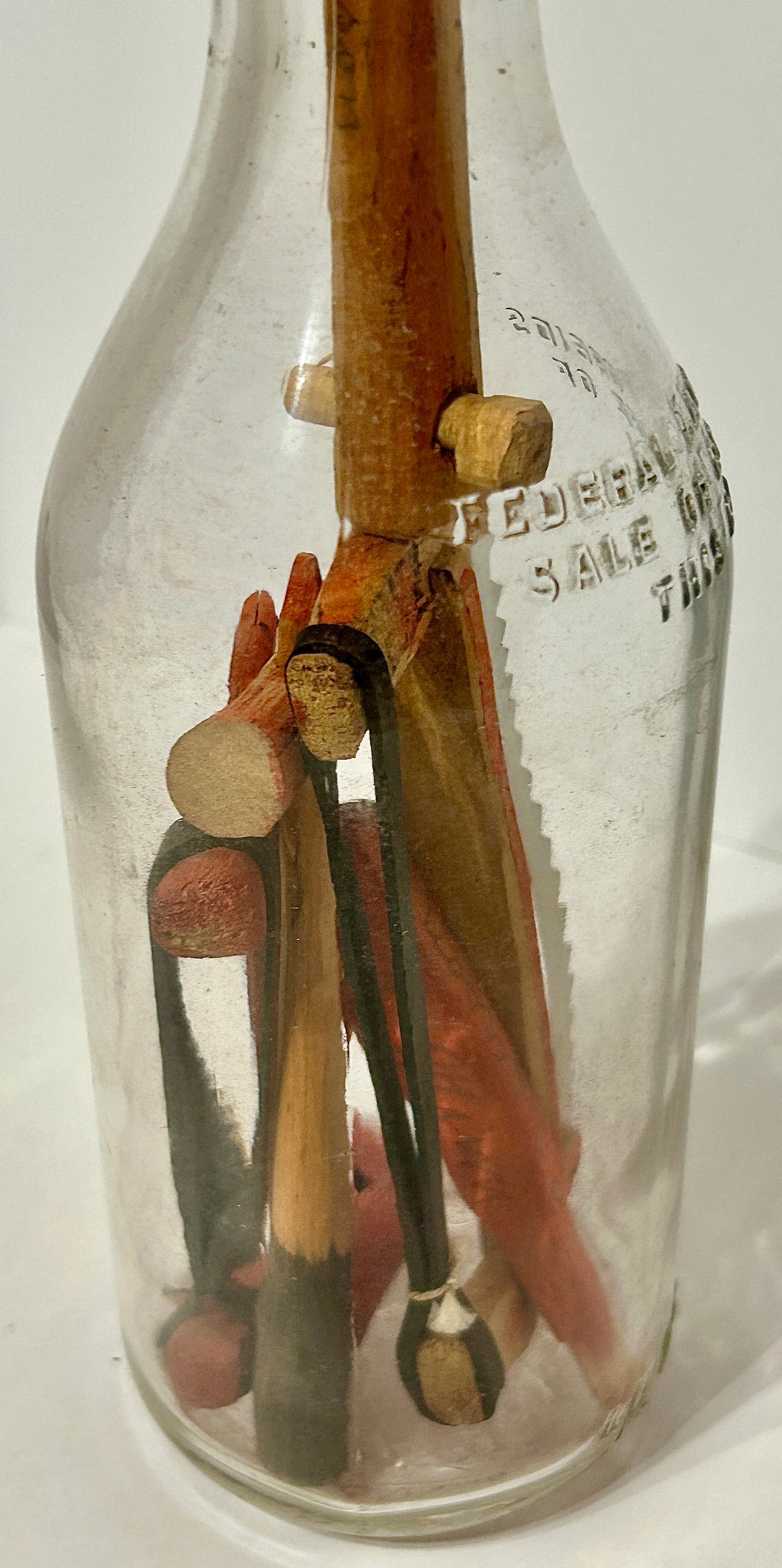 FOLK ART CARVED TOOLS IN BOTTLE