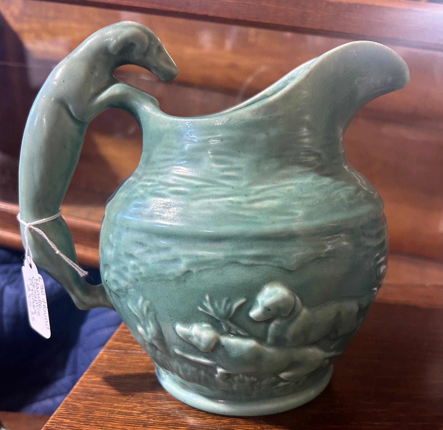 HOUND HANDLE ANTIQUE GREEN POTTERY PITCHER