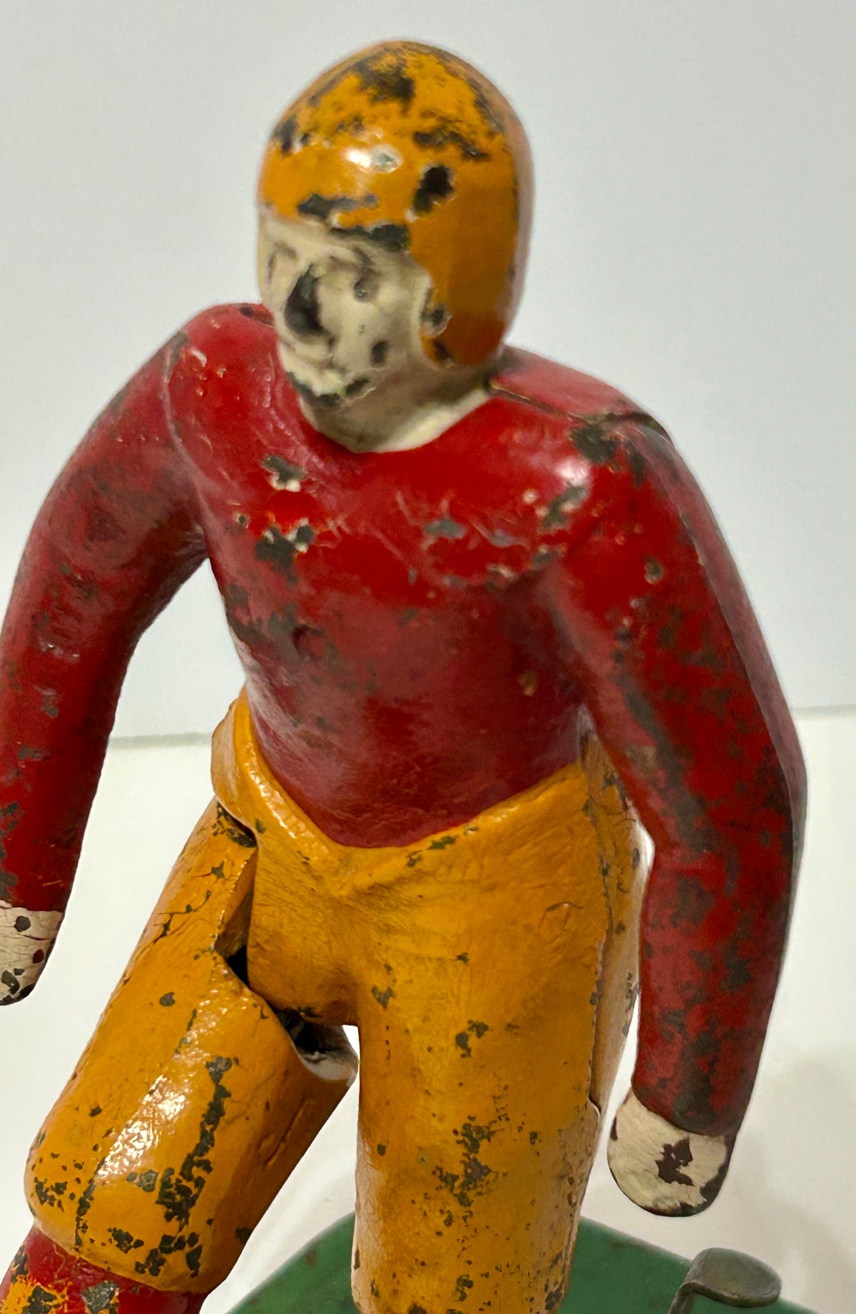 WOOLSEY MECHANICAL FOOTBALL PLAYER KICKING FOOTBALL  IN CAST IRON AND METAL
