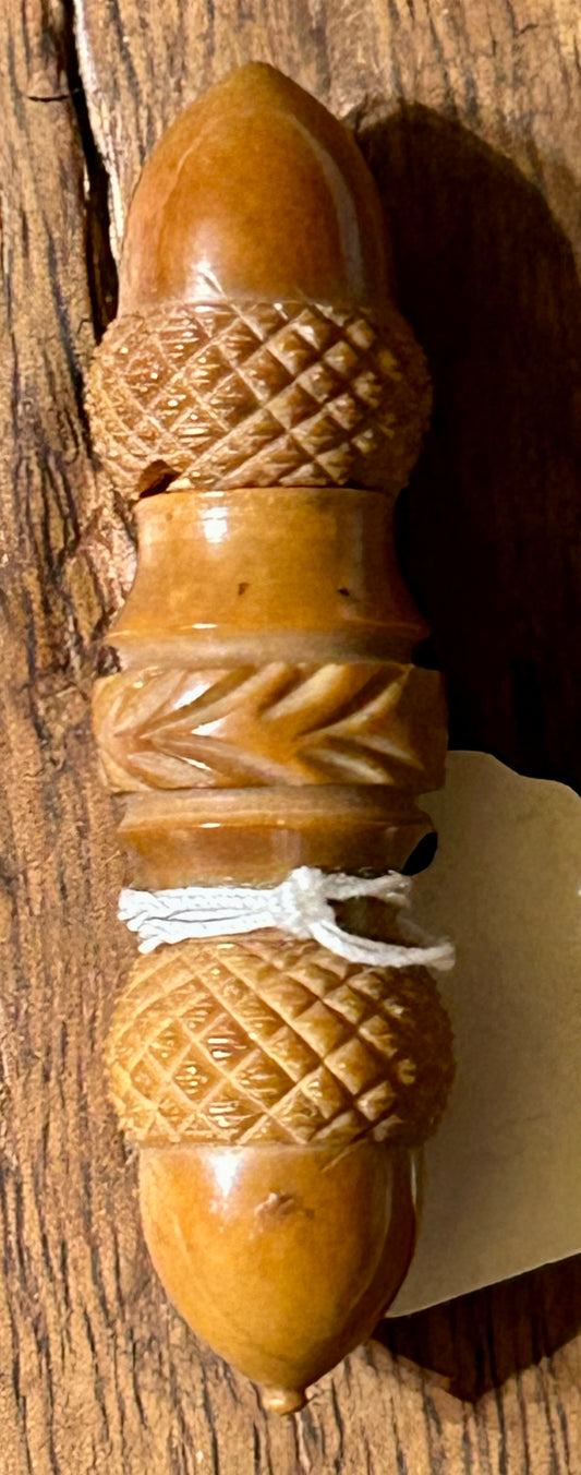 CARVED ACORN TAGUA NUT NEEDLE CASE