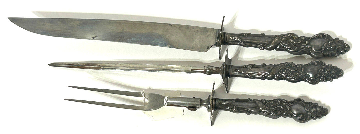 ANTIQUE 3 PIECE CARVING SET WITH SILVER PLATE HANDLES WITH SEA SERPENTS