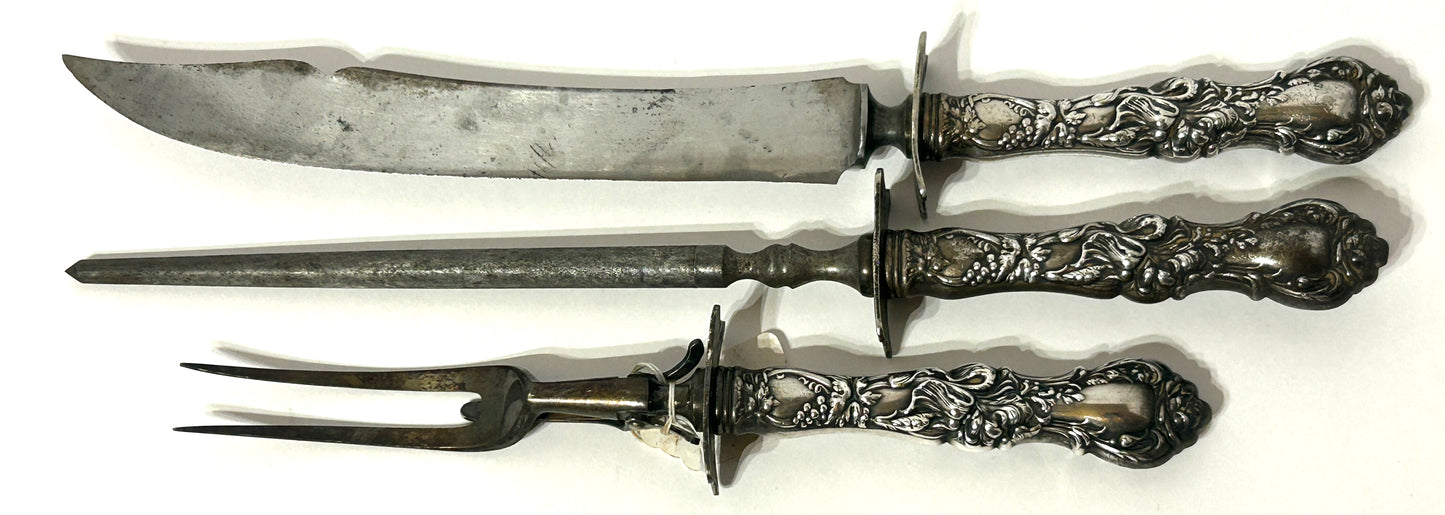 ANTIQUE CARVING SET WITH FANCY SILVER PLATE HANDLES