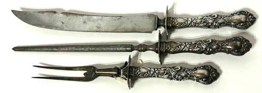 ANTIQUE CARVING SET WITH FANCY SILVER PLATE HANDLES