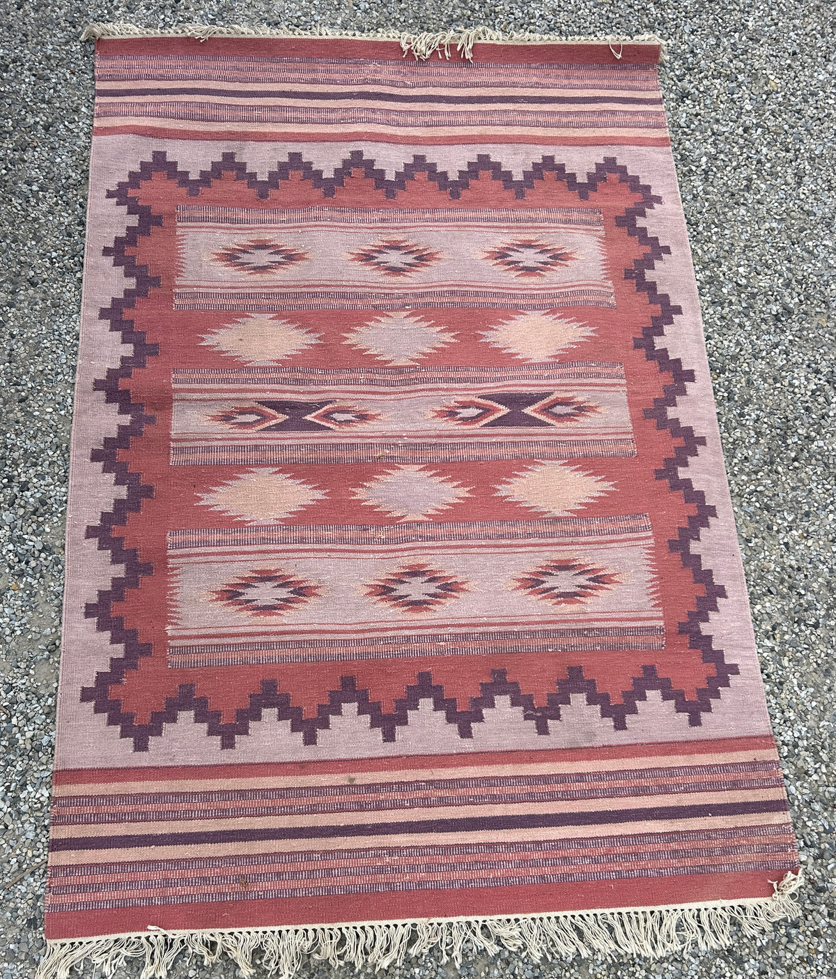 HANDMADE INDIA MAUVE AND PURPLE TRIBAL RUG MARKED WITH FABINDIA LABEL OR REVERSE