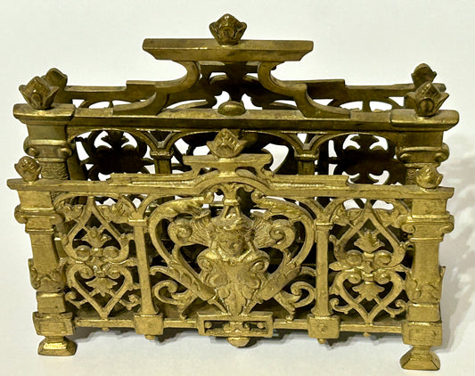 ANTIQUE BRASS FIGURAL HEADS LETTER HOLDER