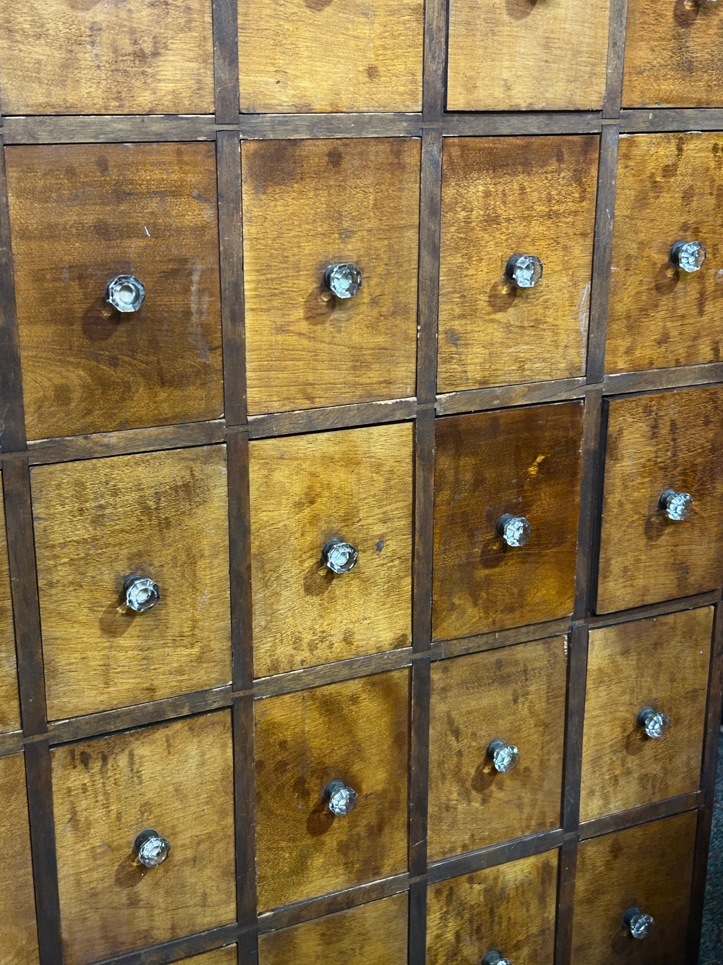 ANTIQUE 35 DRAWER CABINET WITH IUNUSUAL GLASS AND BRASS KNOBS