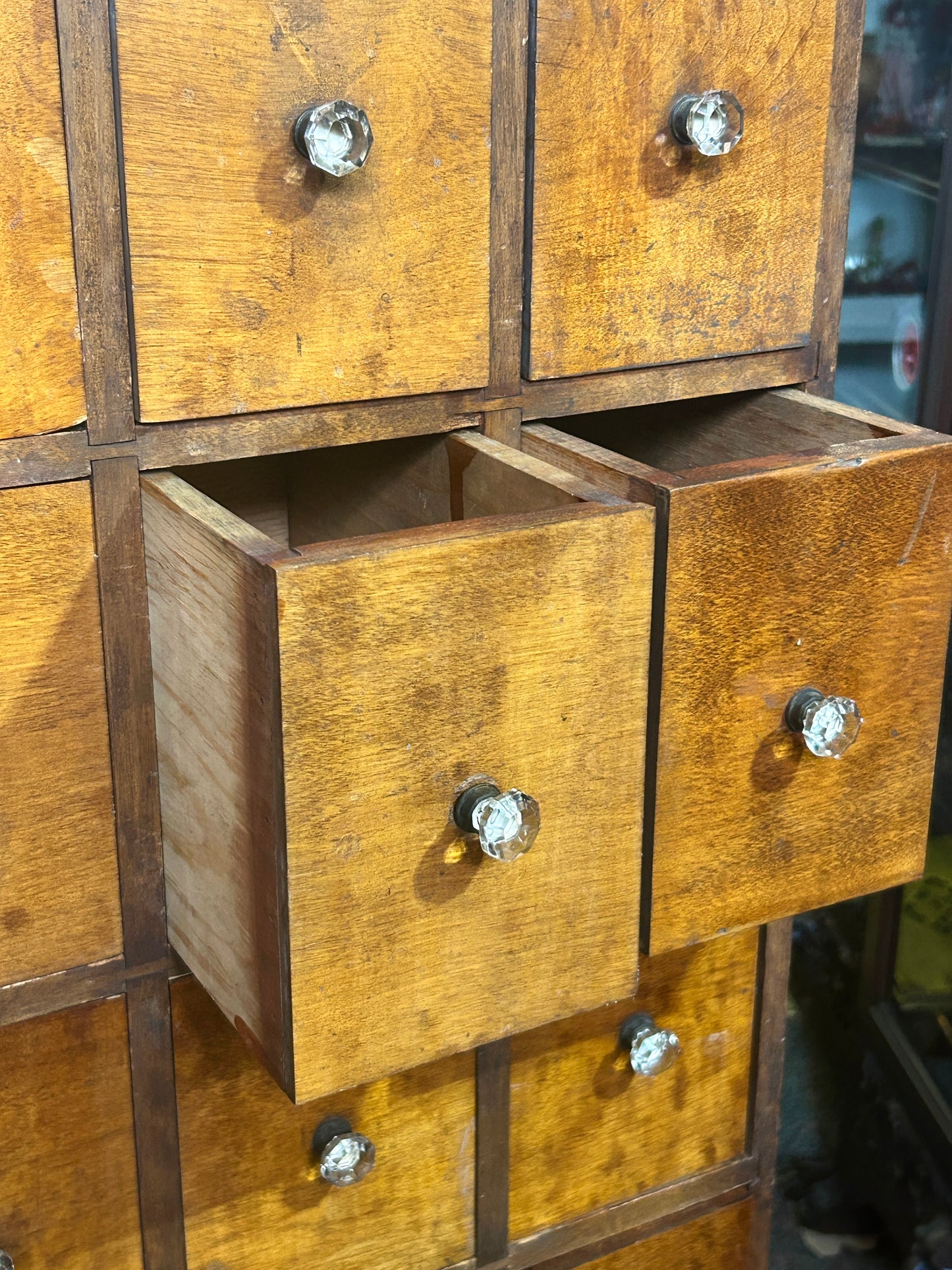 ANTIQUE 35 DRAWER CABINET WITH IUNUSUAL GLASS AND BRASS KNOBS
