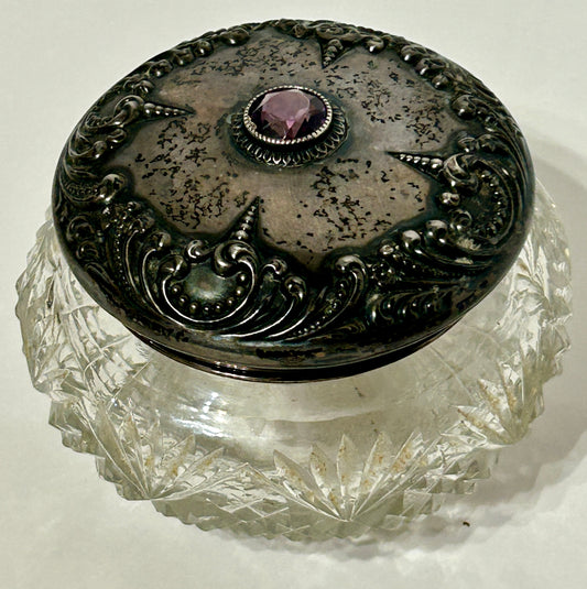 POWDER JAR ANTIQUE WITH STERLING AND AMETHYST COLOR STONE ON CUT GLASS JAR