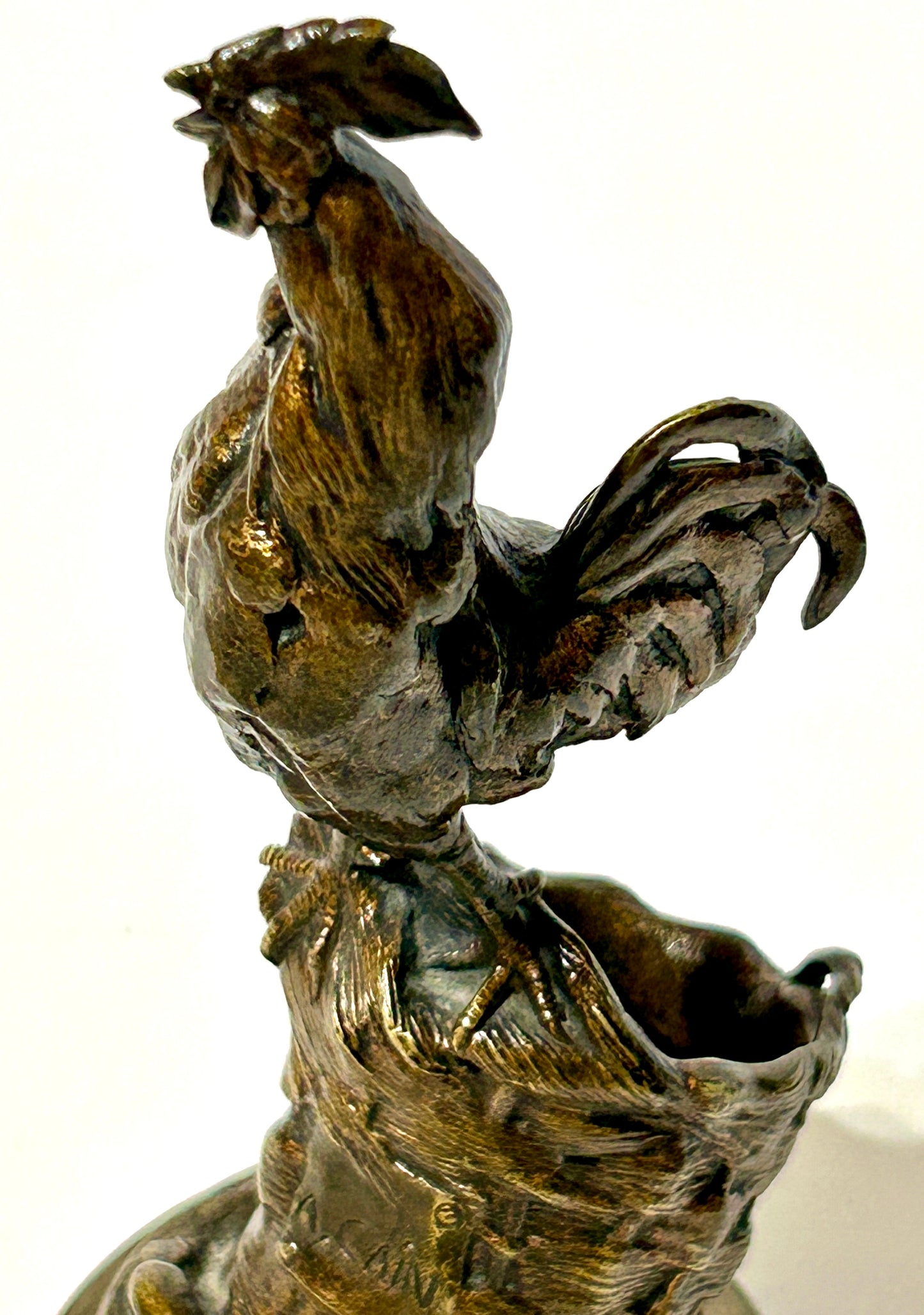 BRONZE CHICKEN ON BASKET BY A. CAIN