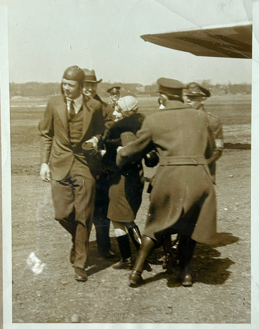 CHARLES LINDBERG BEING PROTECTED FROM FEMALE ADMIRERS PHOTOGRAPH