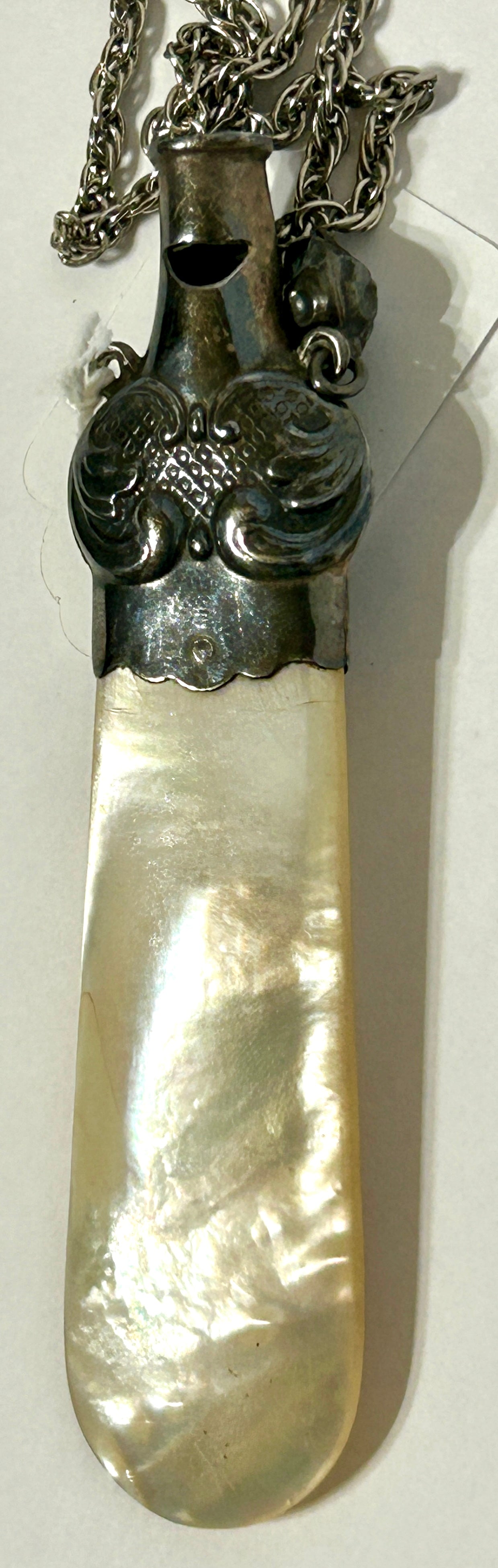 STERLING AND MOTHER OF PEARL ANTIQUE TEETHER AND WHISTLE