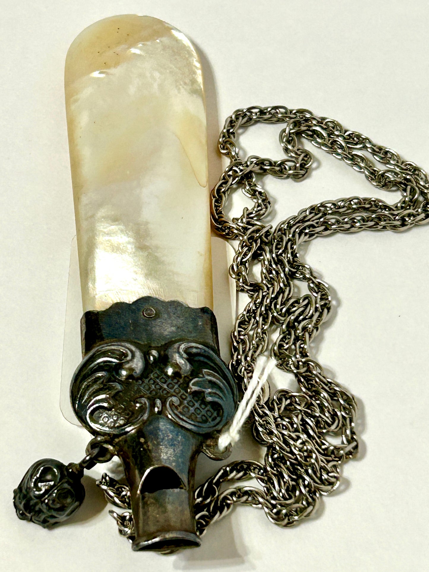 STERLING AND MOTHER OF PEARL ANTIQUE TEETHER AND WHISTLE