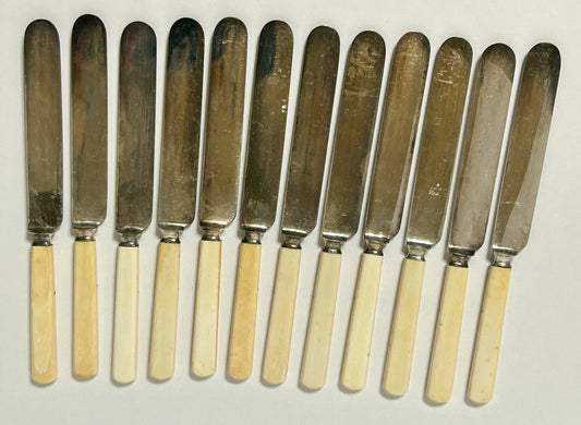 ANTIQUE IVORY HANDLE SET OF TWELVE KNIVES