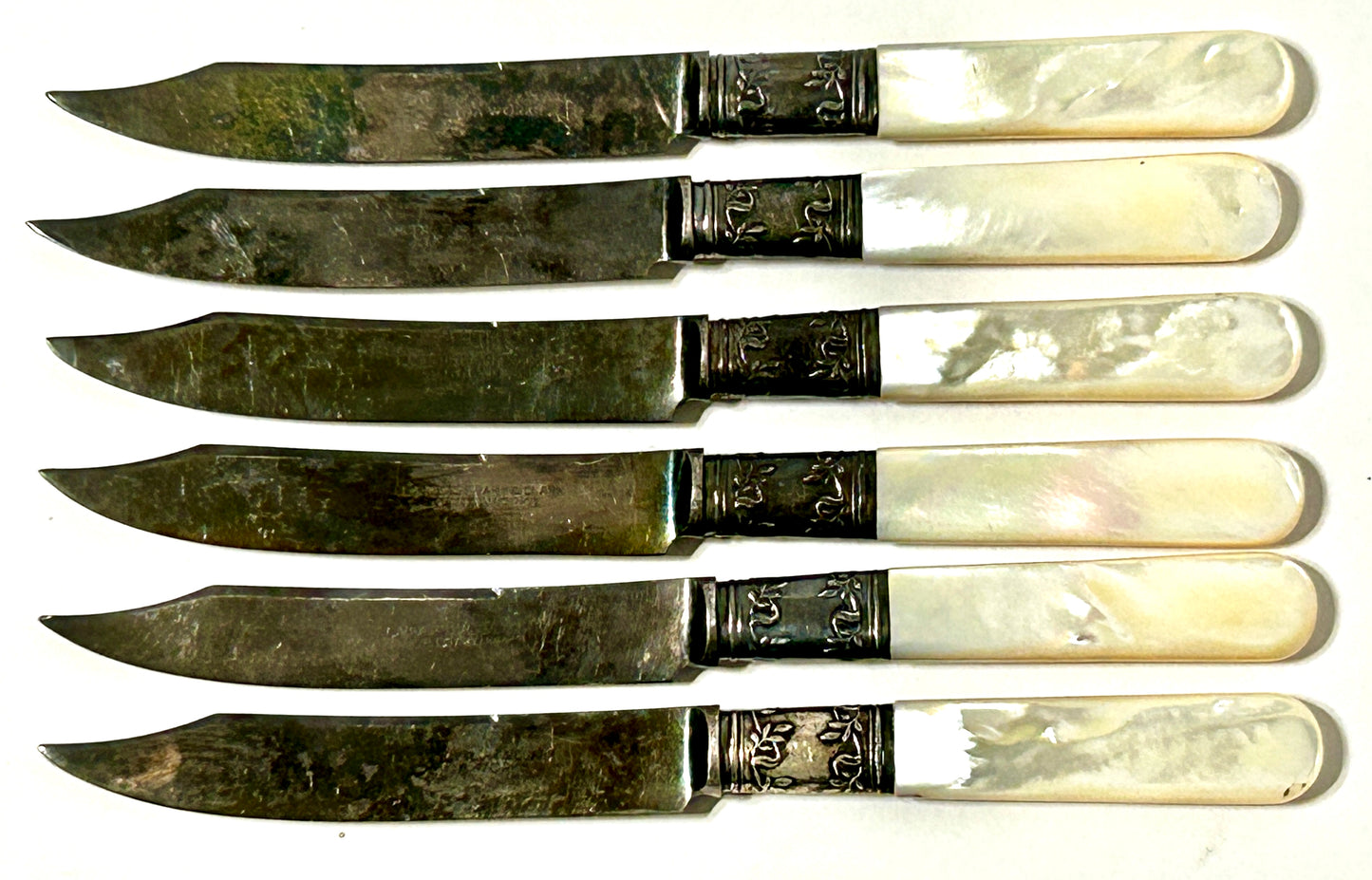 ANTIQUE STERLING AND MOTHER OF PEARL HANDLED FRUIT KNIVES