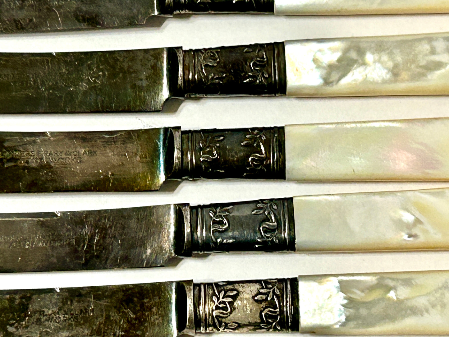 ANTIQUE STERLING AND MOTHER OF PEARL HANDLED FRUIT KNIVES