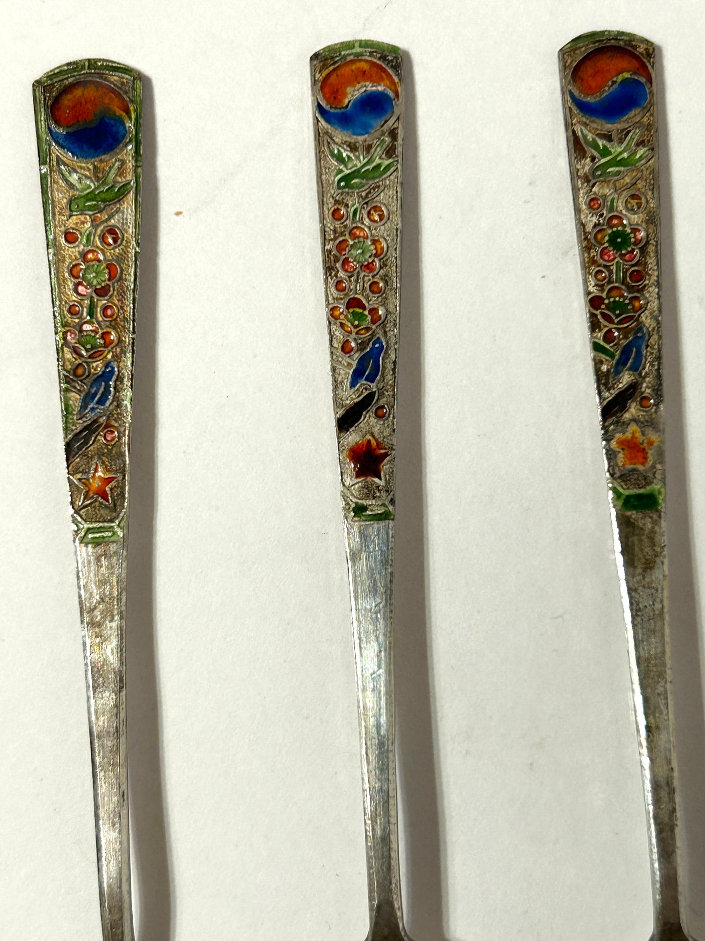 SILVER AND ENAMEL SET ORIENTAL SPOONS