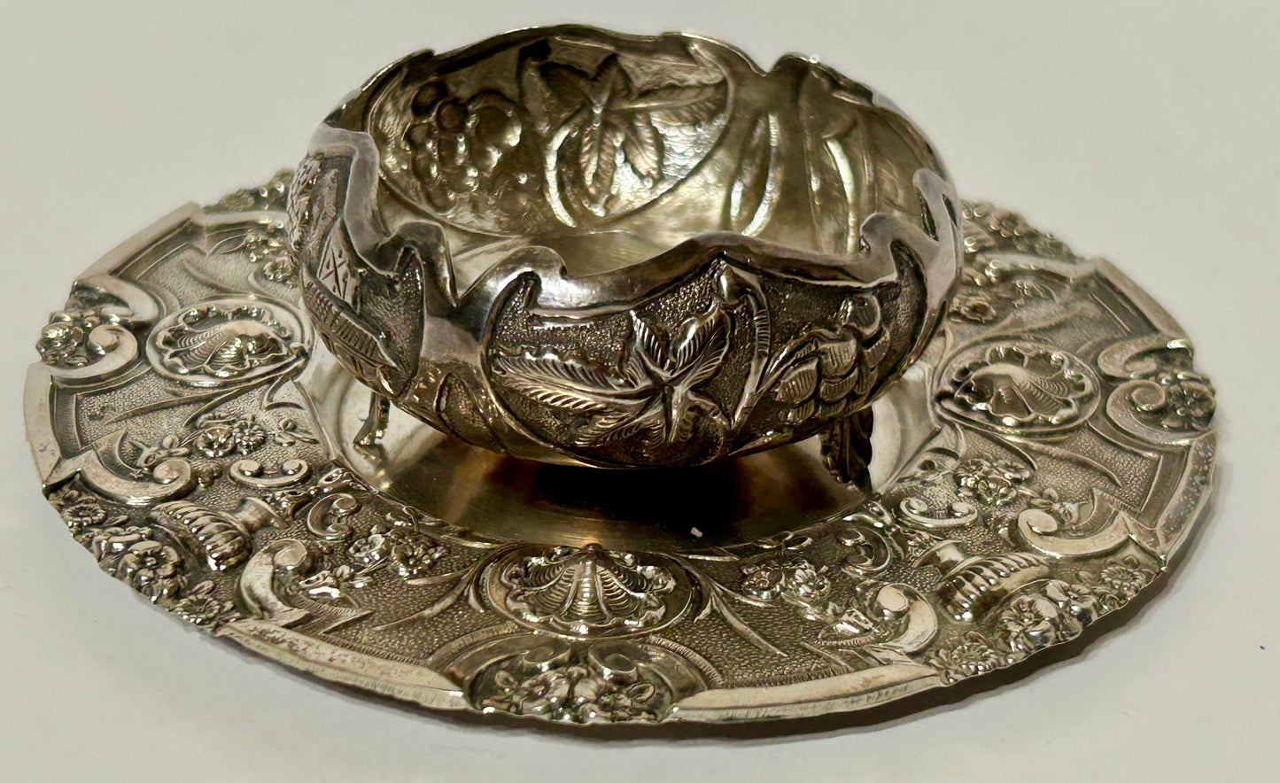 SILVER ANTIQUE SMALL PLATE AND SALT BOWL WITH FANCY DESIGNS