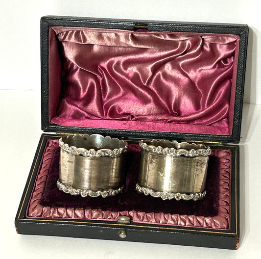 WALKER AND HALL PAIR OF ANTIQUE SILVER NAPKIN RINGS